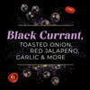 An artistic display features the text Black Currant, Toasted Onion, Red Jalapeño, Garlic &amp; More, surrounded by black currants and a slice of red jalapeño, likely for a McCormick product.