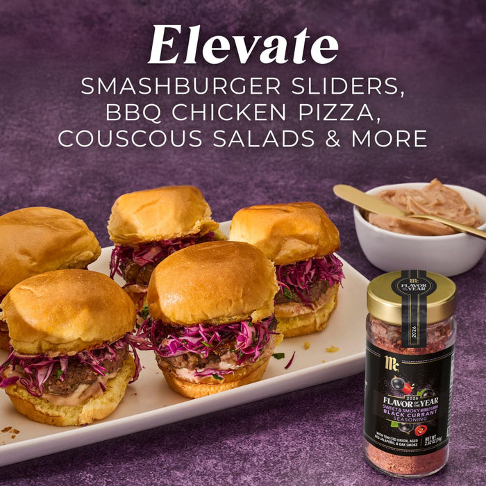 A jar of McCormick 2026 Flavor of the Year Sweet &amp; Smoky Naturally Flavored Black Currant Seasoning sits next to a plate of smashburger sliders.