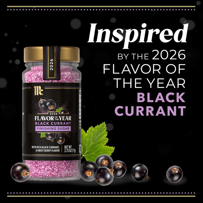 A jar of McCormick 2026 Flavor of the Year Black Currant Finishing Sugar is displayed with fresh black currants.