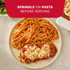 A plate of chicken parmesan and spaghetti is shown as a serving suggestion for Mccormick Savory Herb Parmesan Seasoning, 2.5 Oz, which can be sprinkled on before serving.
