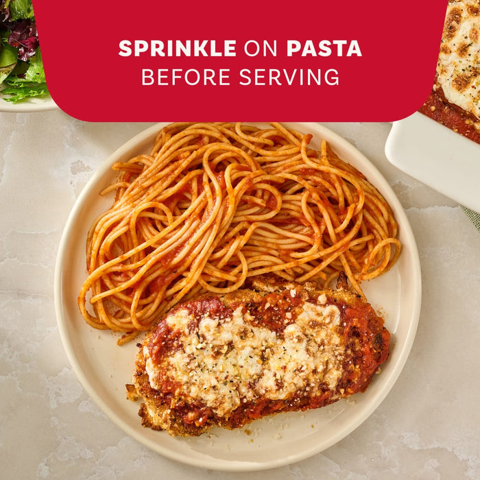 A plate of chicken parmesan and spaghetti is shown as a serving suggestion for Mccormick Savory Herb Parmesan Seasoning, 2.5 Oz, which can be sprinkled on before serving.
