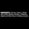 Ingredients list showing sea salt, garlic, spices including smoked paprika and turmeric, onion, and extractives of paprika (color).