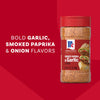 A bottle of Mccormick Smoked Paprika And Garlic Seasoning, 3.12 Oz, is shown against a red background with text on the left that reads, BOLD GARLIC, SMOKED PAPRIKA &amp; ONION FLAVORS.