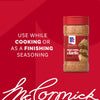 A bottle of Mccormick Smoked Paprika And Garlic Seasoning, 3.12 Oz, is featured in an advertisement on a red background with text suggesting to use it while cooking or as a finishing seasoning.