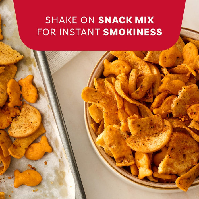 A bowl of snack mix and some on a baking sheet are shown seasoned with Mccormick Smoked Paprika And Garlic Seasoning, 3.12 Oz to add instant smokiness.