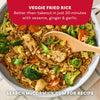 A pan of colorful veggie fried rice is presented as a quick 20-minute meal idea from McCormick, a dish that can be made with Mccormick Sesame Ginger Seasoning, 2.5 Oz.