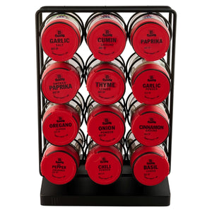 A Kamenstein spice rack with twelve red-topped spice jars is displayed.