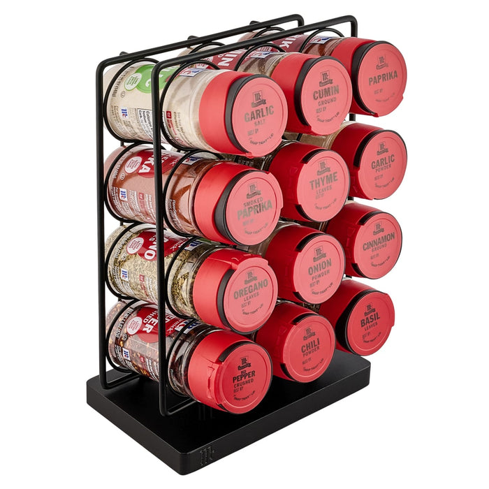 A black metal storage rack displays several red and other colored Nespresso Vertuo coffee pods.