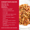 A McCormick shrimp pasta recipe card, featuring ingredients like McCormick Basil Leaves and Garlic Powder, which are typically found in a Mccormick Spice Rack Red Cap Black Metal 12 Ct, displayed next to a plate of the finished pasta dish.