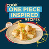 A plate of cooked fish chunks, seasoned with a product from Mccormick, 10.49 Oz, is featured in a promotional image for Cook One Piece Inspired Recipes.