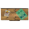A top-down illustration of a wooden crate-style box, adorned with pirate-themed stickers, is used to represent a package of Mccormick, 10.49 Oz.