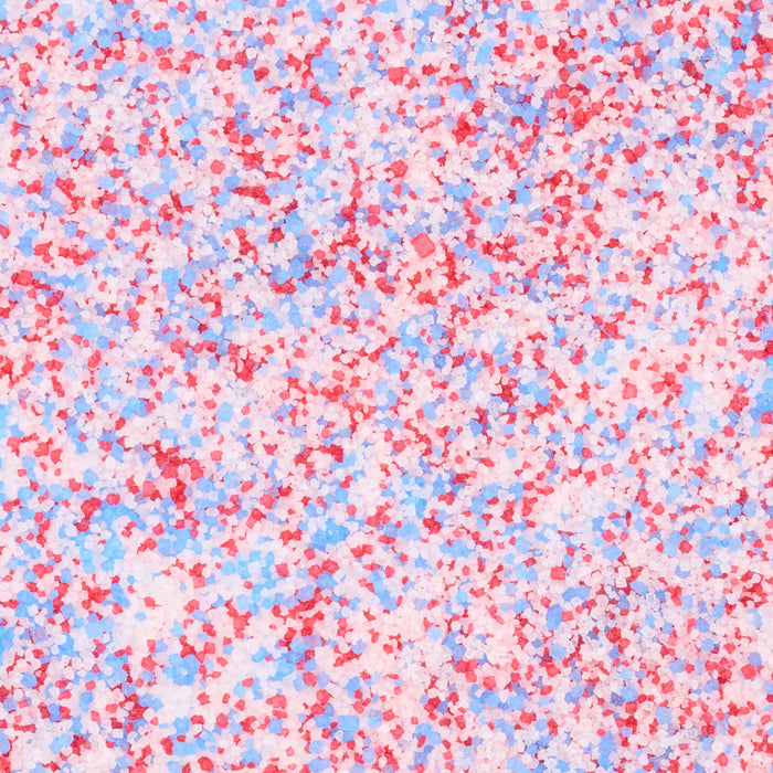 A close-up, top-down view shows the red, white, and blue sugar crystals of the Mc Mixed Berry Fin Sgr 72/6/3.15 Oz.