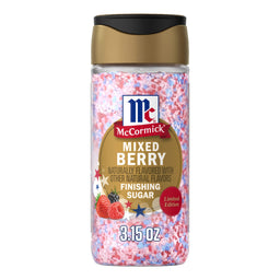 A clear shaker bottle of Mc Mixed Berry Fin Sgr 72/6/3.15 Oz, showing the red, white, and blue sugar crystals inside, with a label featuring the McCormick logo, illustrations of berries, and the words Mixed Berry Finishing Sugar.