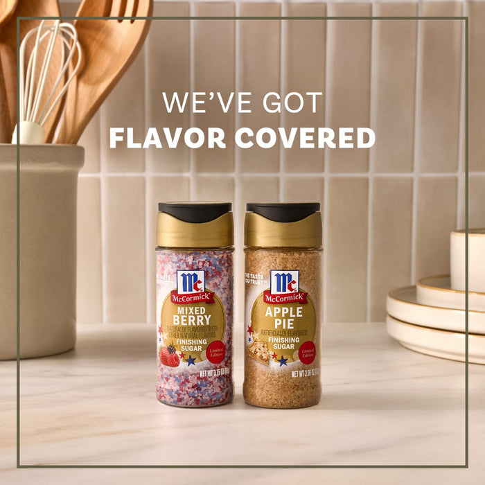 A bottle of Mccormick Apple Pie Finishing Sugar, 3.06 Oz sits next to a bottle of McCormick Mixed Berry Finishing Sugar on a kitchen counter, with text overlay reading, We've got flavor covered.