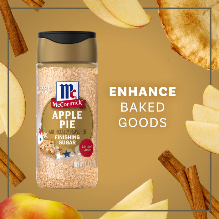 A promotional image features a bottle of Mccormick Apple Pie Finishing Sugar, 3.06 Oz, surrounded by apple slices and cinnamon sticks to illustrate how it can enhance baked goods.
