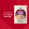 A promotional graphic for Mc Thai Gn Curry Mix featuring a seasoning packet next to a bowl of shrimp and vegetables over rice with text highlighting a ten minute prep time in one pan.