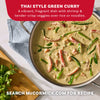 A large stainless steel pan filled with a vibrant Thai Style Green Curry featuring shrimp and tender-crisp vegetables prepared with Mc Thai Gn Curry Mix.