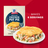 A package of Mc Chkn Pot Pie Mix is displayed next to a prepared serving of the skillet chicken pot pie which makes 6 servings and features no artificial flavors.