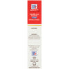 McCormick Vanilla Flavor Clear a bottle of vanilla extract with a red label.