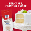 A box of McCormick Vanilla Flavor is displayed next to a cake highlighting its use for cakes frosting and more.