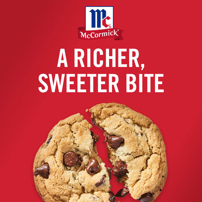 A broken chocolate chip cookie with the McCormick logo above it and the text A richer sweeter bite on a red background.