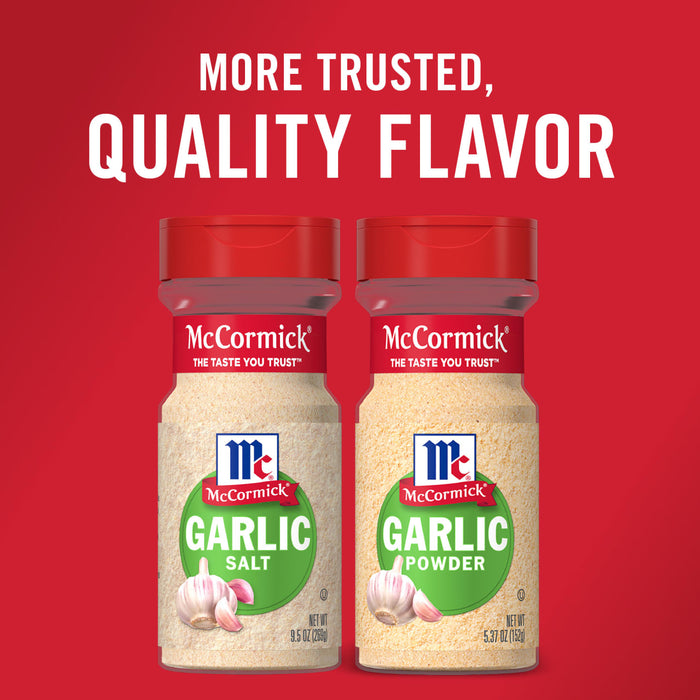 Two McCormick spice jars one with garlic salt and one with garlic powder.