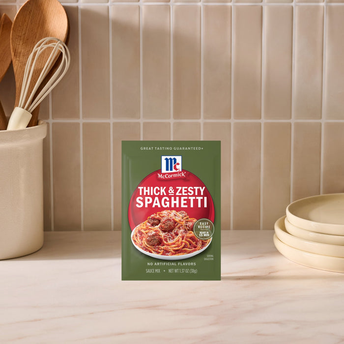 A packet of McCormick Thick &amp; Zesty Spaghetti Sauce Mix.
