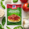 ['A package of McCormick Thick &amp; Zesty Spaghetti Sauce Mix with ingredients like garlic, basil, tomatoes, and onions.']