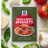 A package of McCormick Thick &amp; Zesty Spaghetti Sauce Mix with ingredients like garlic, basil, tomatoes, and onions.