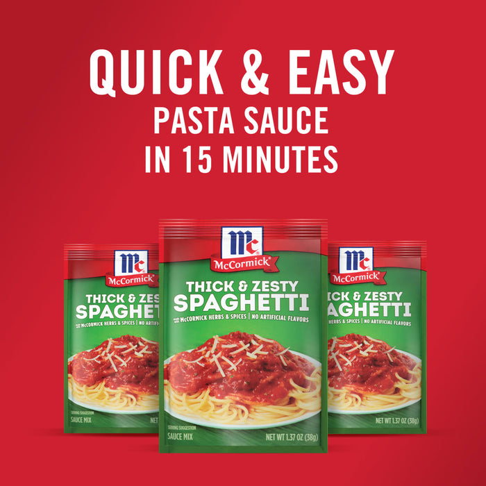['Three McCormick Thick &amp; Zesty Spaghetti sauce mix packets.']