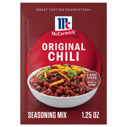 A product package for Mccormick Chili Seasoning Mix 1.25 Oz, featuring a bowl of chili topped with cheese and green onions.