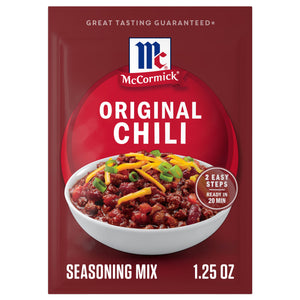 A product package for Mccormick Chili Seasoning Mix 1.25 Oz, featuring a bowl of chili topped with cheese and green onions.