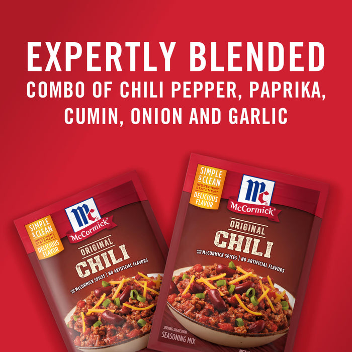 ['Two McCormick Original Chili seasoning mix packages with a red background.']
