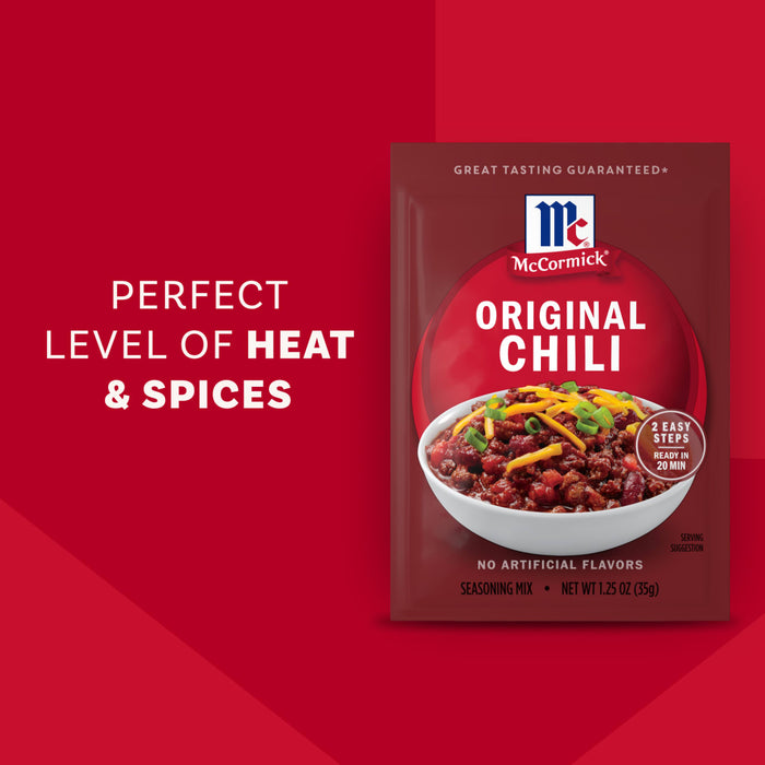 Two packets of Mccormick Chili Seasoning Mix 1.25 Oz are shown, featuring a bowl of chili on the packaging and text describing its expertly blended chili pepper, paprika, cumin, onion, and garlic.