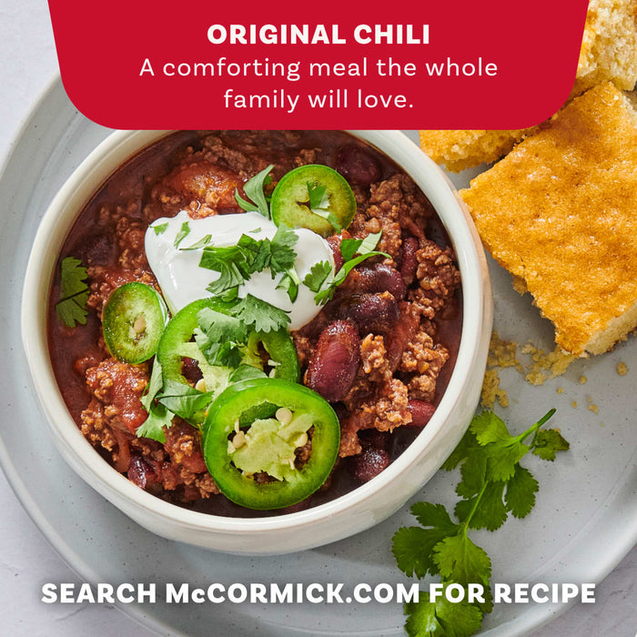 An easy chili recipe is presented with ingredients and instructions, featuring a bowl of chili topped with cheese, sour cream, and green onions, and a visible package of Mccormick Chili Seasoning Mix 1.25 Oz.