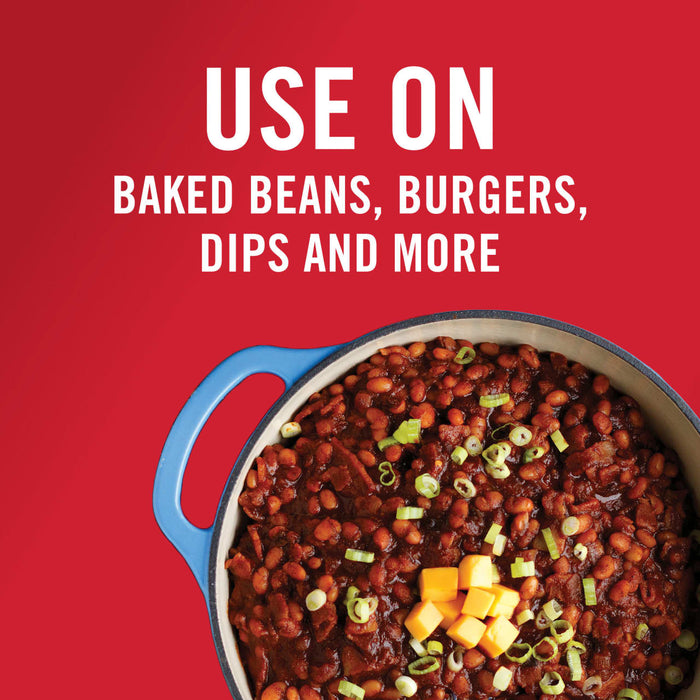 ['A pot of baked beans with cheese and green onions on top, with the text USE ON BAKED BEANS, BURGERS, DIPS AND MORE above.']