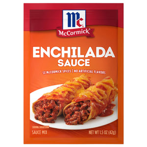 ['A McCormick Enchilada Sauce package with a serving suggestion of enchiladas on the front.']