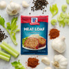 A package of McCormick Meat Loaf seasoning mix with ingredients like garlic celery and peppercorns.