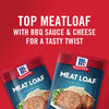 Two McCormick Meatloaf packages with a red background and the text Top Meatloaf with BBQ Sauce &amp; Cheese for a Tasty Twist.