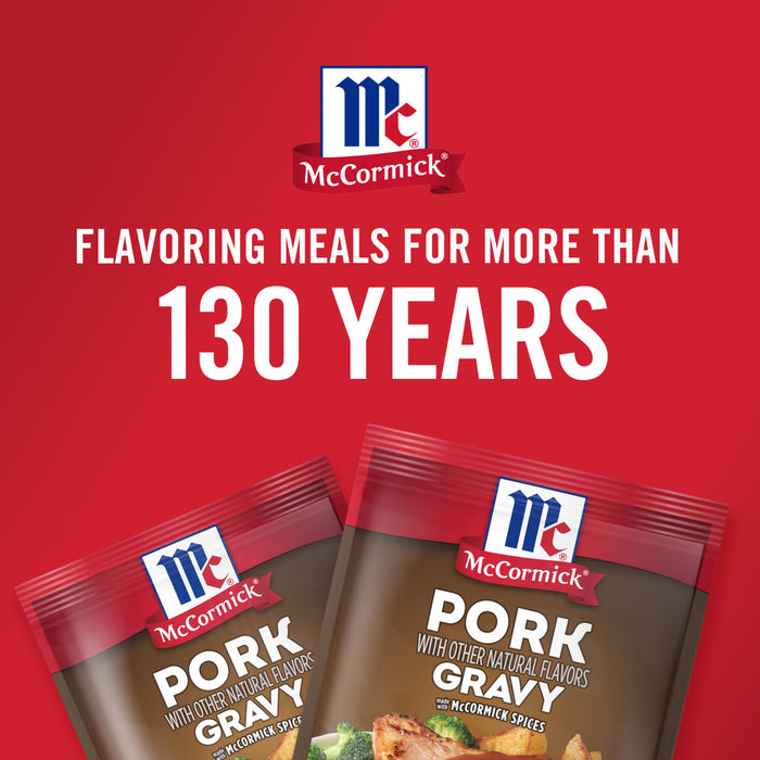 Two McCormick Pork Gravy seasoning packets are shown on a red background with the McCormick logo and the text Flavoring meals for more than 130 years.