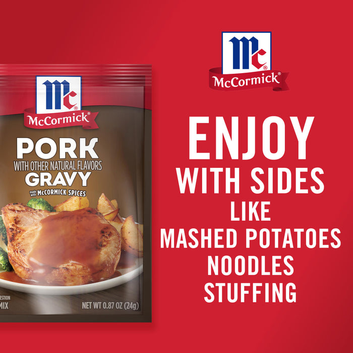 ['McCormick Pork Gravy packet with a picture of a pork chop with gravy and potatoes on a plate.']