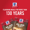 ['Two McCormick Au Jus Gravy packets are shown on a red background.']