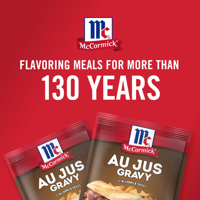 ['Two McCormick Au Jus Gravy packets are shown on a red background.']