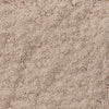 A close-up view of the finely textured, light brown powder that is Mccormick Au Jus Gravy Mix 1 Oz.