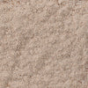 ['A close-up of a light brown sand texture.']