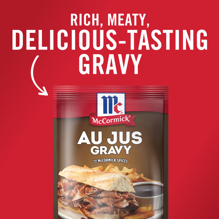 ['A package of McCormick Au Jus Gravy with a sandwich and french fries on the front.']