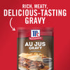 ['A package of McCormick Au Jus Gravy with a sandwich and french fries on the front.']