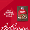 A package of McCormick Brown Gravy with a picture of mashed potatoes and gravy on the front.