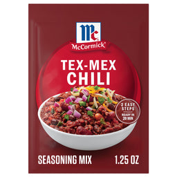 A package of Mccormick Tex Mex Chili Seasoning Mix 1.25 Oz features a bowl of hearty chili topped with red onions and shredded cheese.