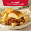 A pull-apart Tex-Mex sloppy joe slider served with a side of potato chips is seasoned with Mccormick Tex Mex Chili Seasoning Mix 1.25 Oz.
